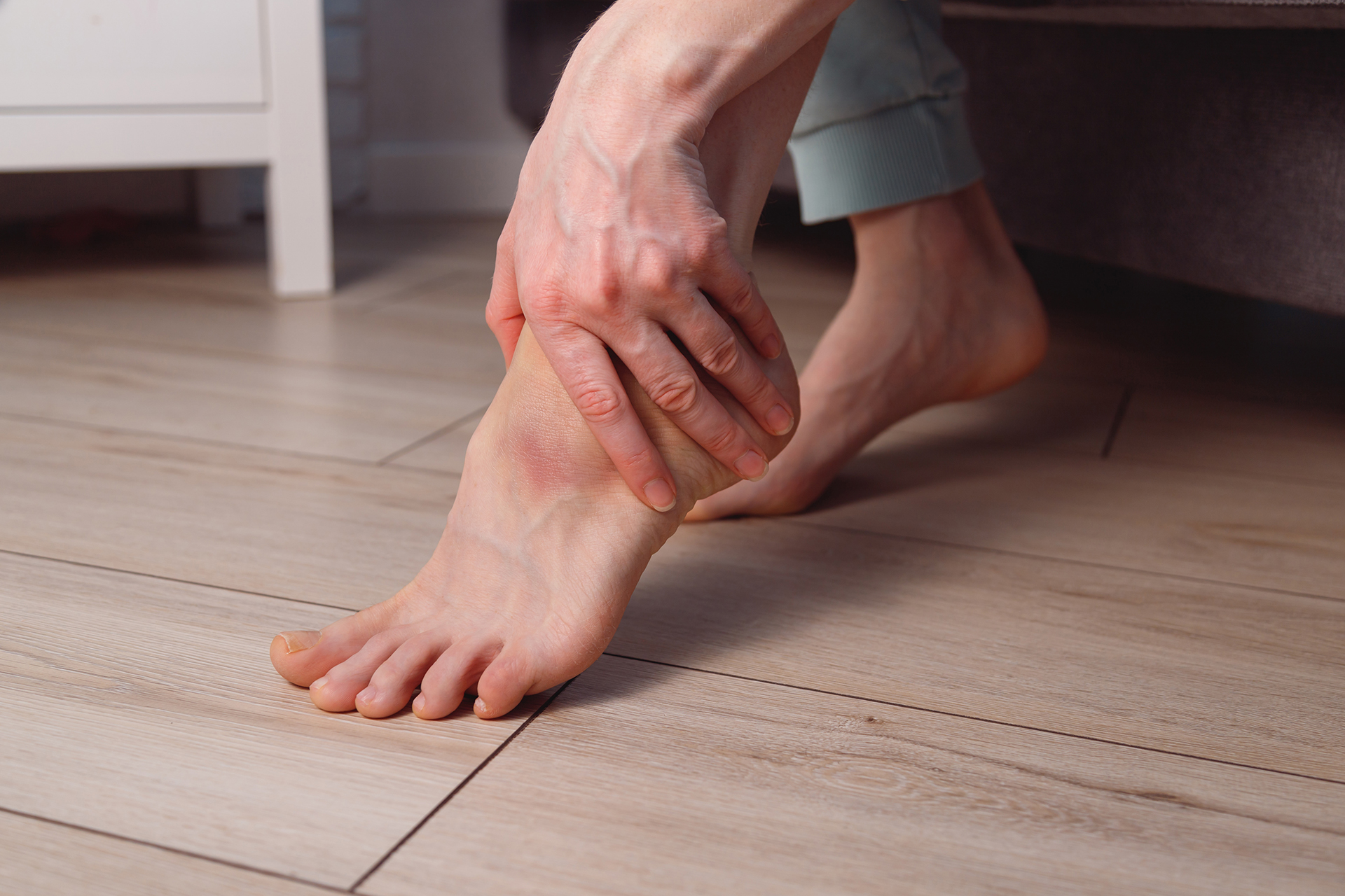 what causes gout in ankle